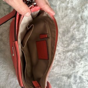 Coach cross body bag in beautiful coral color